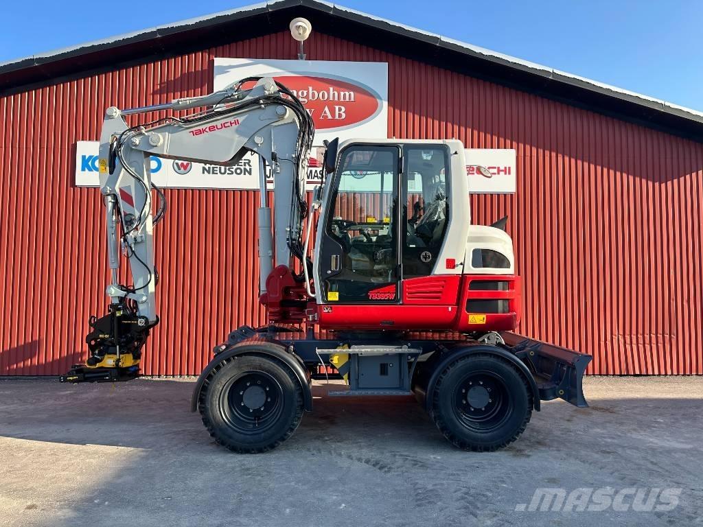 Takeuchi TB 395 W Excavatoare cu roti