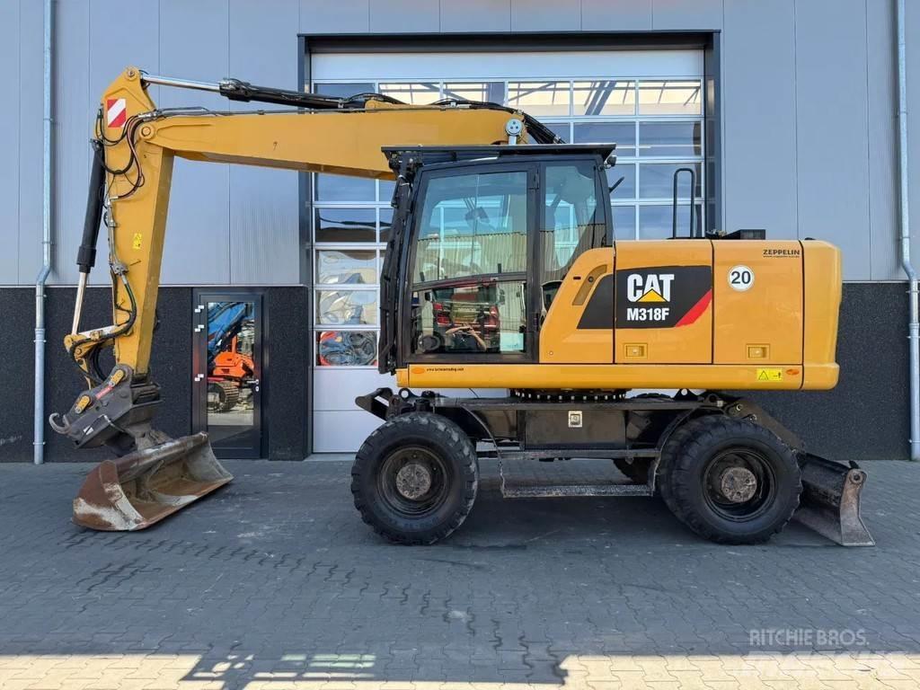 CAT M318F Excavatoare cu roti