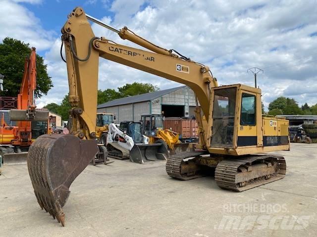 CAT 215 Excavatoare pe șenile
