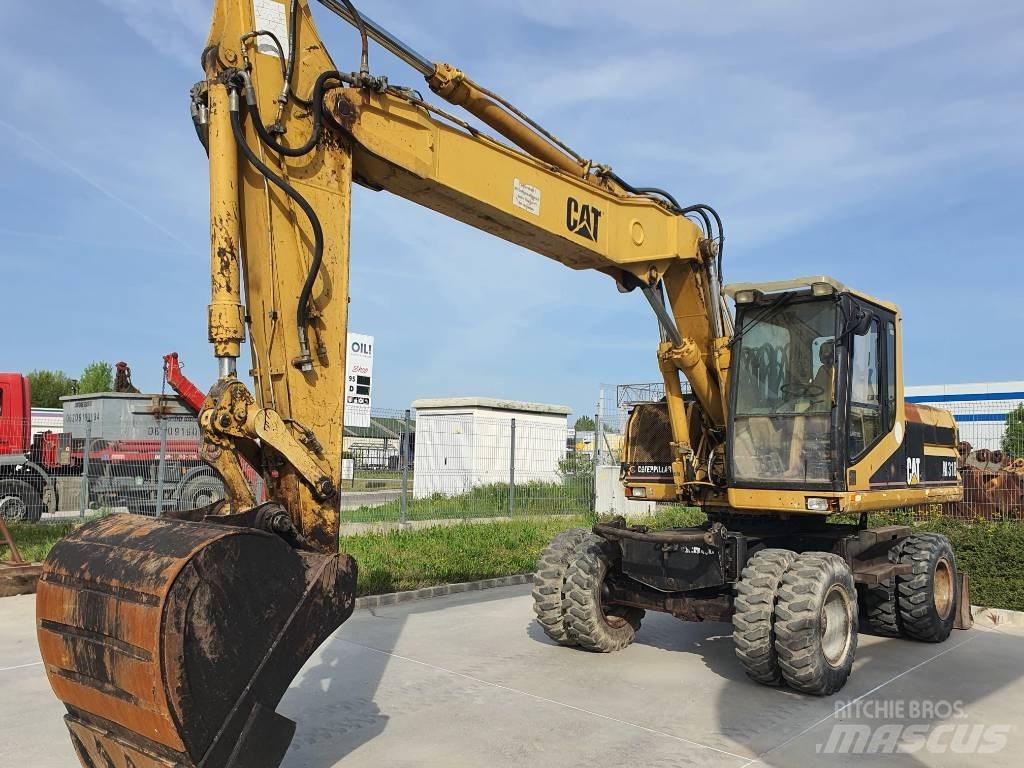 CAT M 318 Excavatoare cu roti