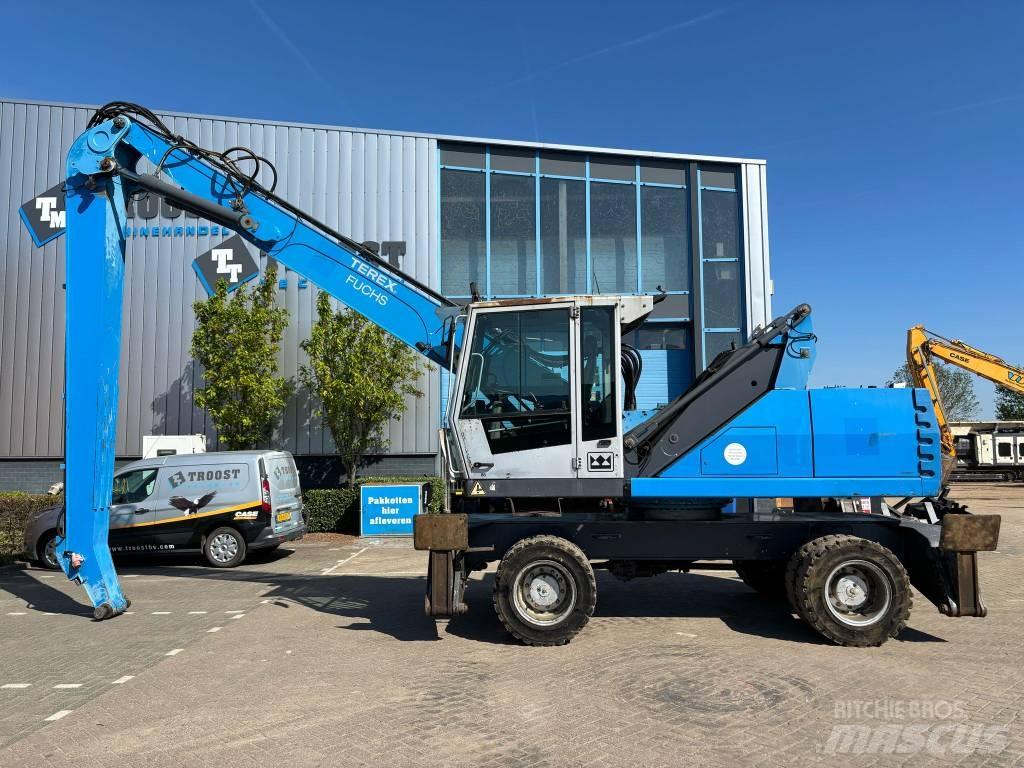 Fuchs MHL 335 Paleta de manipulare