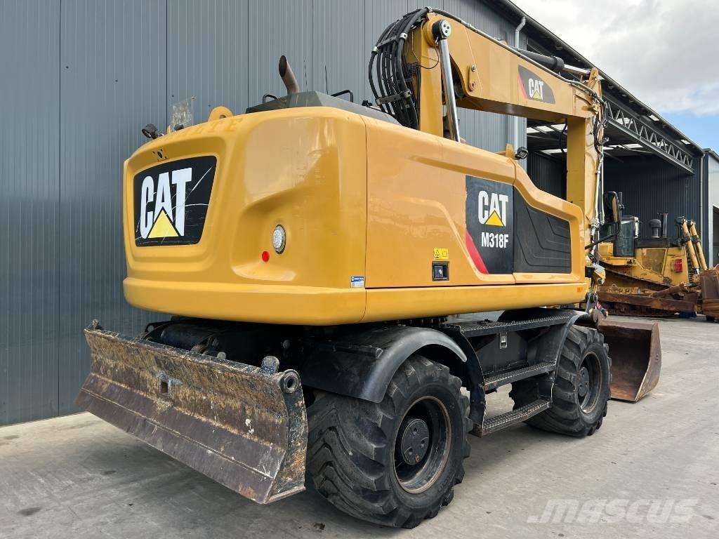 CAT M318F Excavatoare cu roti