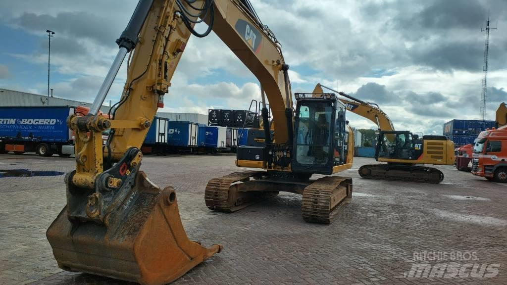 CAT 323 EL Excavatoare pe șenile
