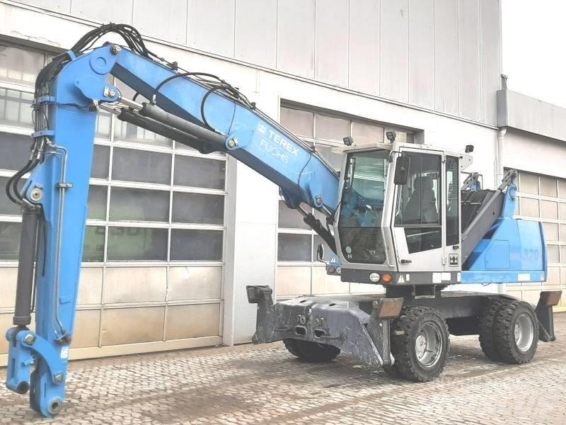 Fuchs MHL 320 D Paleta de manipulare