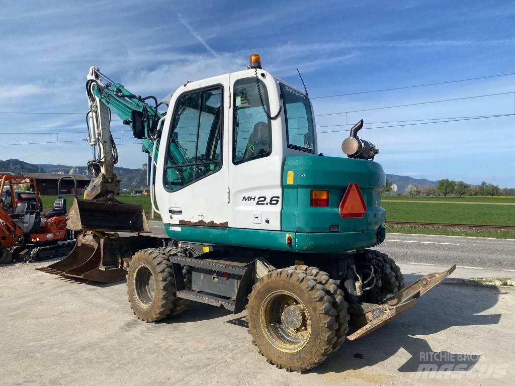 New Holland MH 2.6 Excavatoare cu roti