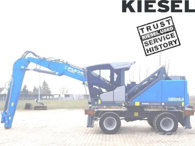 Fuchs MHL 320 F Paleta de manipulare