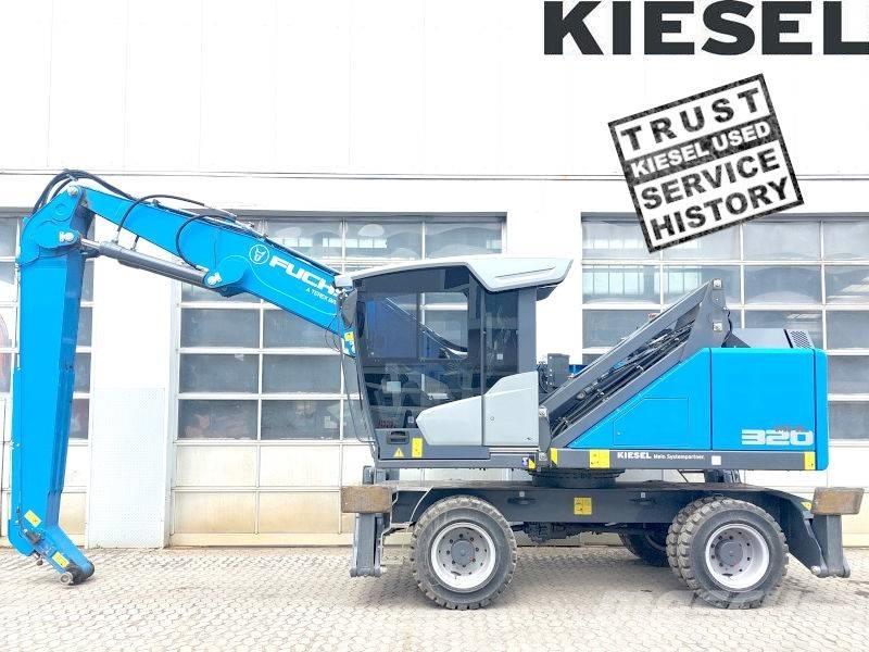 Fuchs MHL 320 F Paleta de manipulare