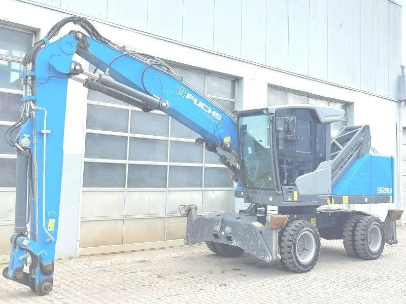 Fuchs MHL 320 F Paleta de manipulare