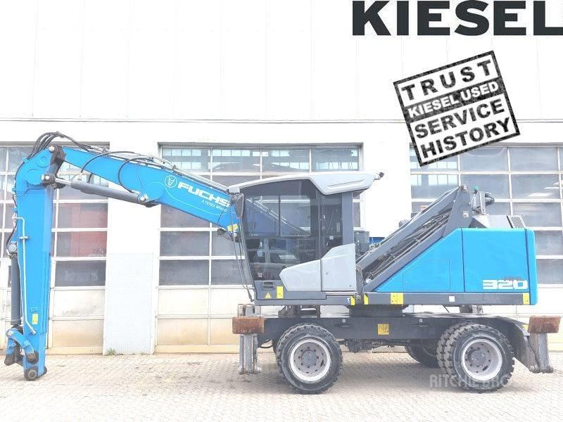 Fuchs MHL 320 F Paleta de manipulare
