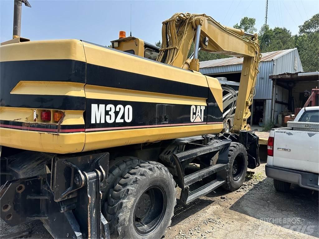 CAT M320 Excavatoare cu roti