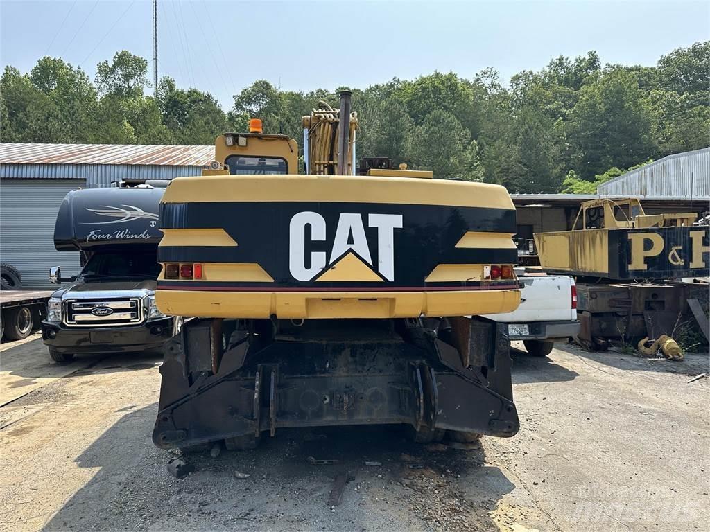 CAT M320 Excavatoare cu roti