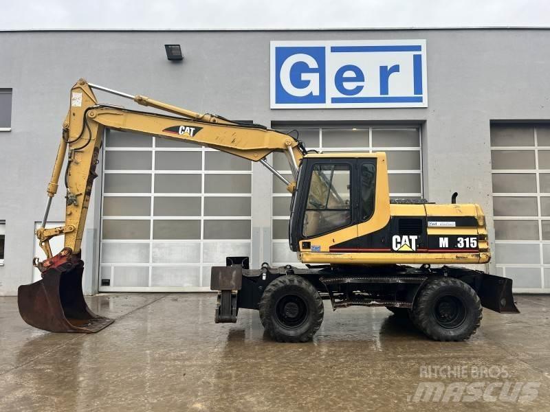 CAT M 315 Excavatoare cu roti