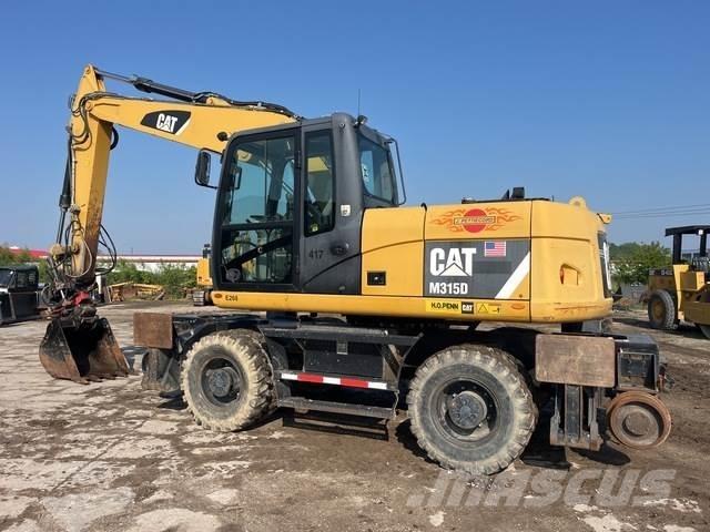 CAT M315D Excavatoare cu roti