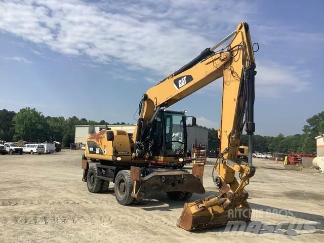 CAT M318D Excavatoare cu roti