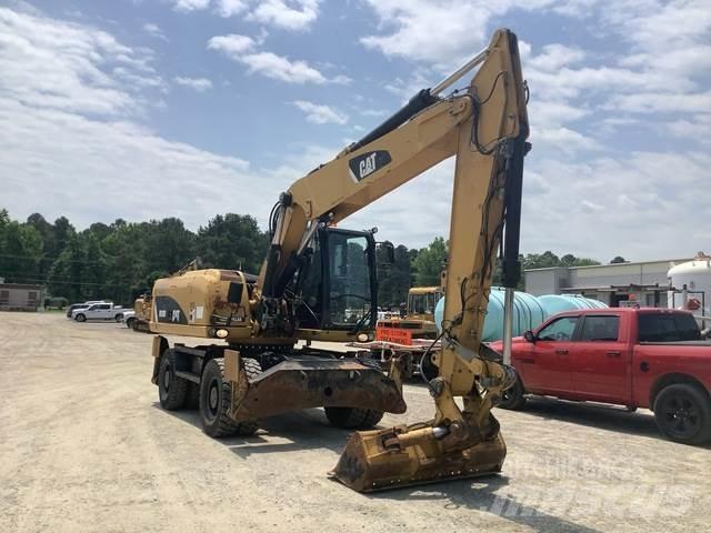 CAT M318D Excavatoare cu roti
