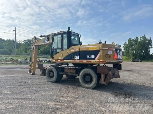 CAT M318D Excavatoare cu roti