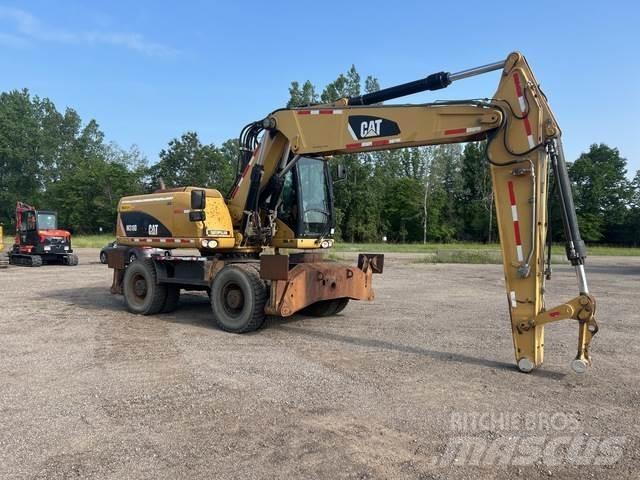 CAT M318D Excavatoare cu roti