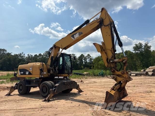 CAT M318D Excavatoare cu roti
