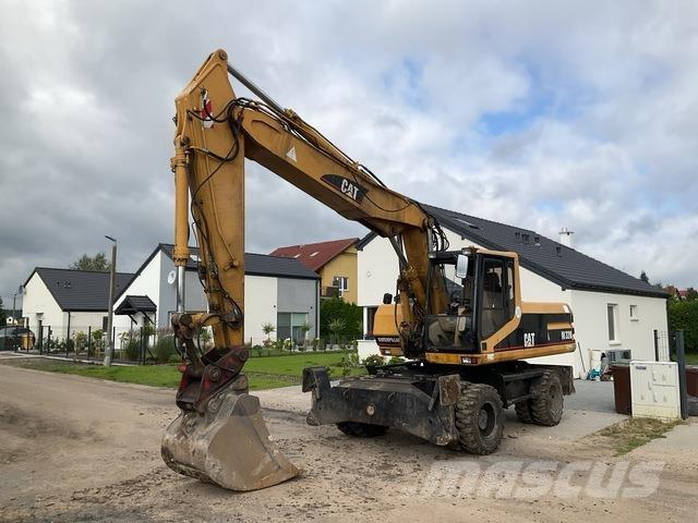 CAT M320 Excavatoare cu roti