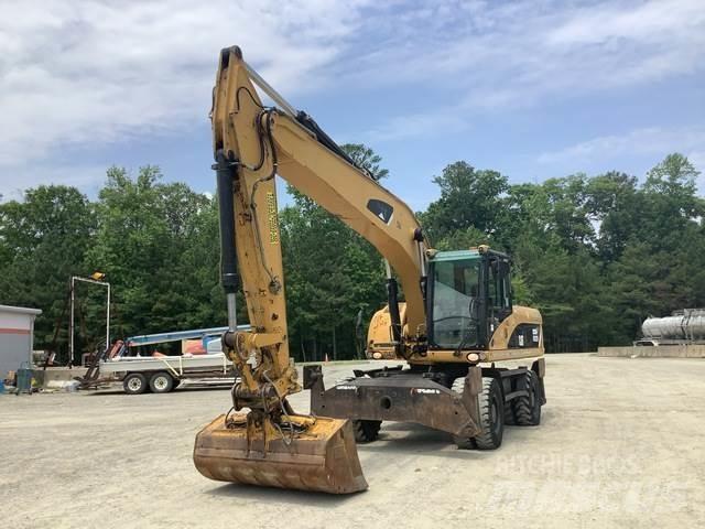 CAT M322D Excavatoare cu roti