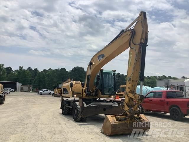 CAT M322D Excavatoare cu roti