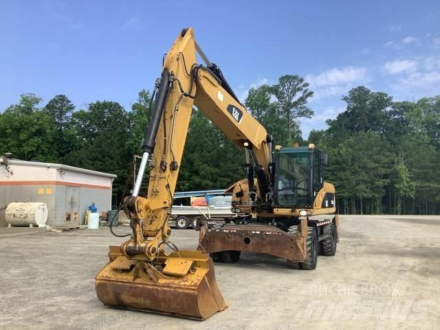 CAT M322D Excavatoare cu roti