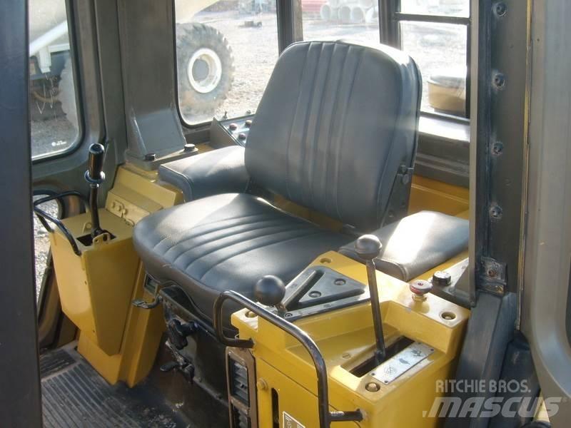 CAT 943 Încarcatoare cu excavator