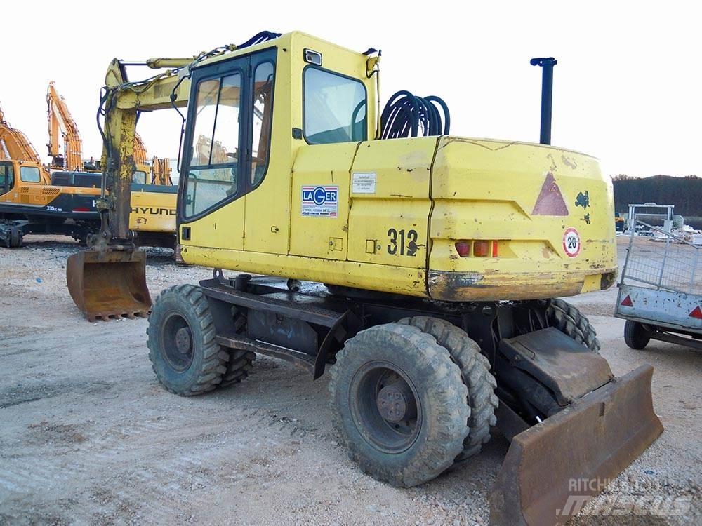 CAT M312 Excavatoare cu roti