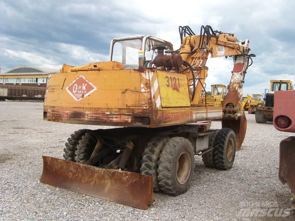 O&K MH6 Excavatoare cu roti