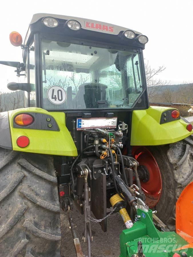 CLAAS Axos 330 CX Tractoare