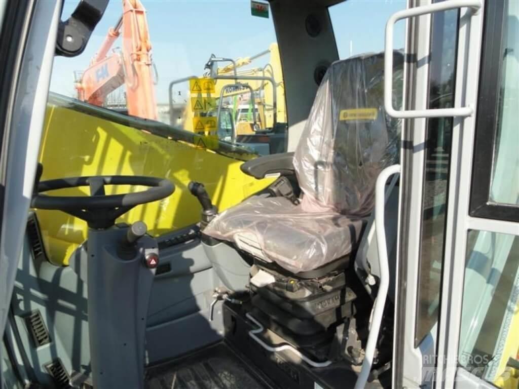 New Holland WE210 Excavatoare cu roti