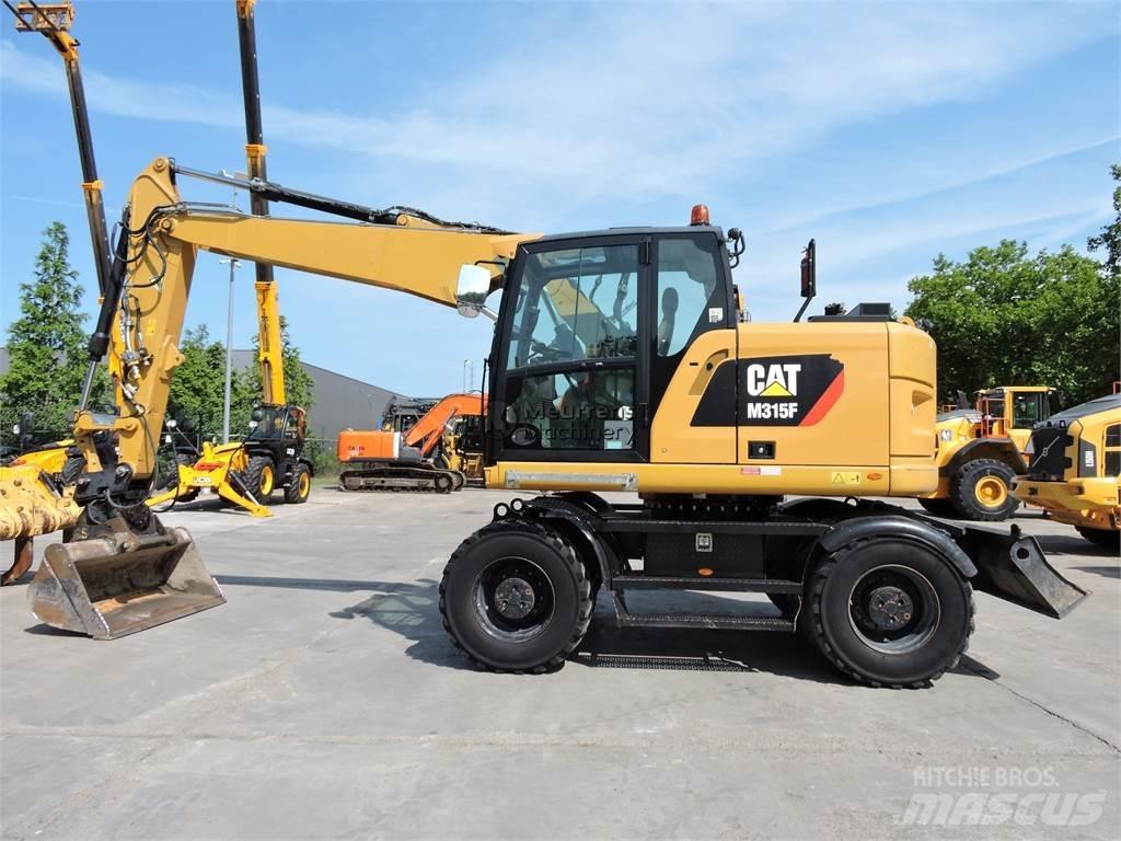 CAT M315 Excavatoare cu roti