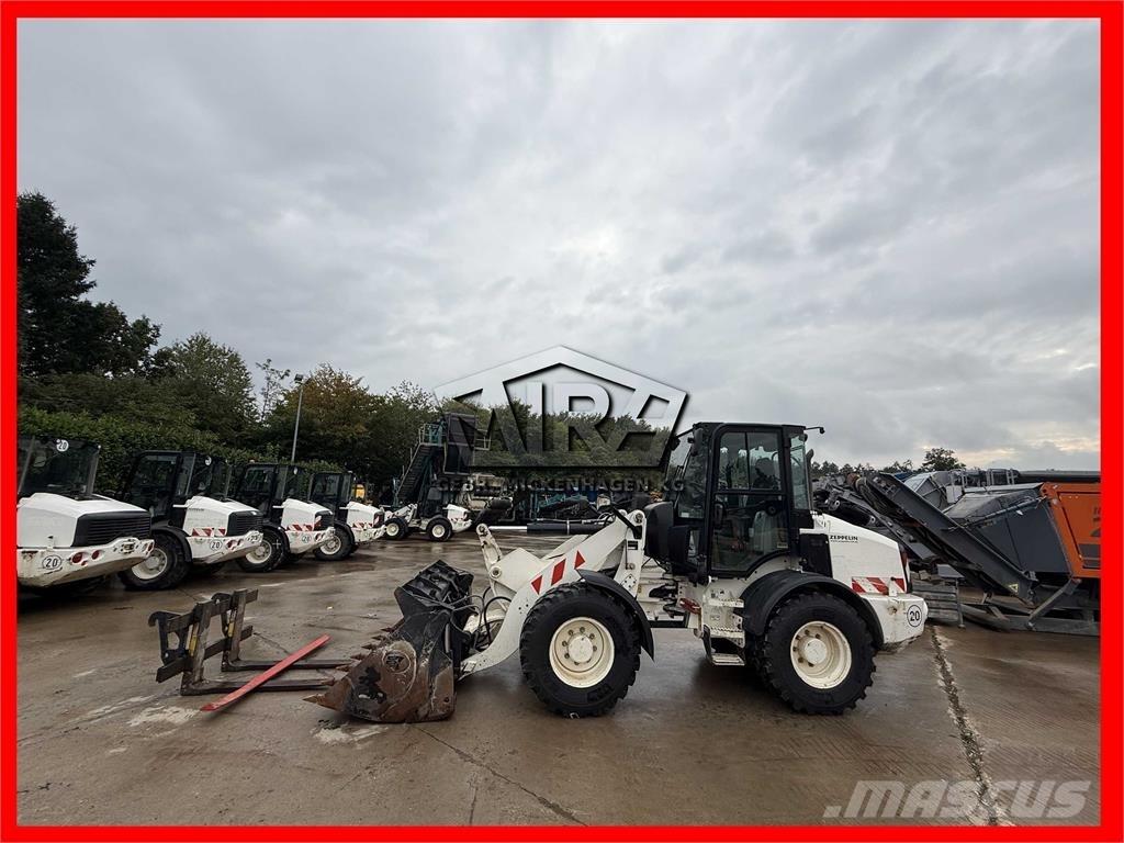 CAT 908M Incarcator pe pneuri