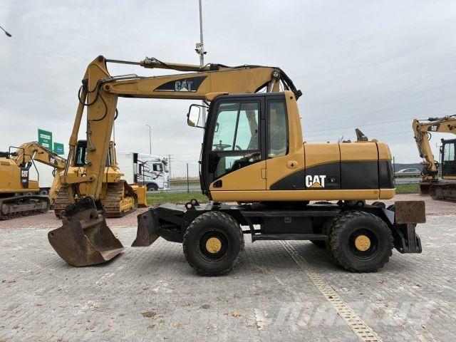 CAT M313C Utilaje construcții - Altele