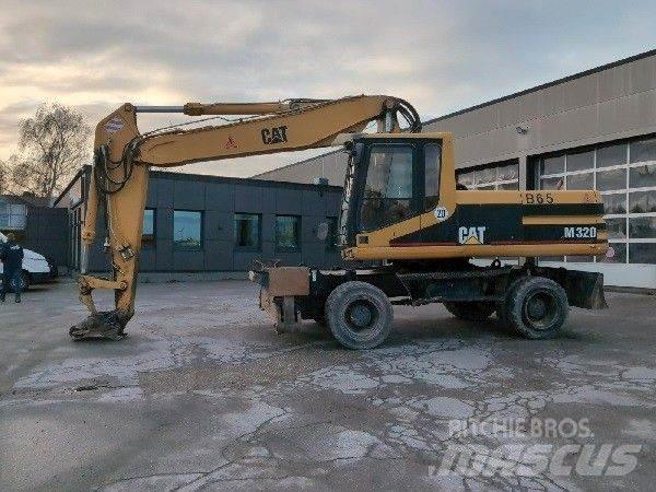 CAT M320 Excavatoare cu roti