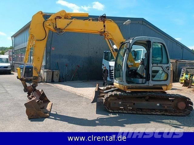 New Holland E70SR 4 Buldoexcavatoare