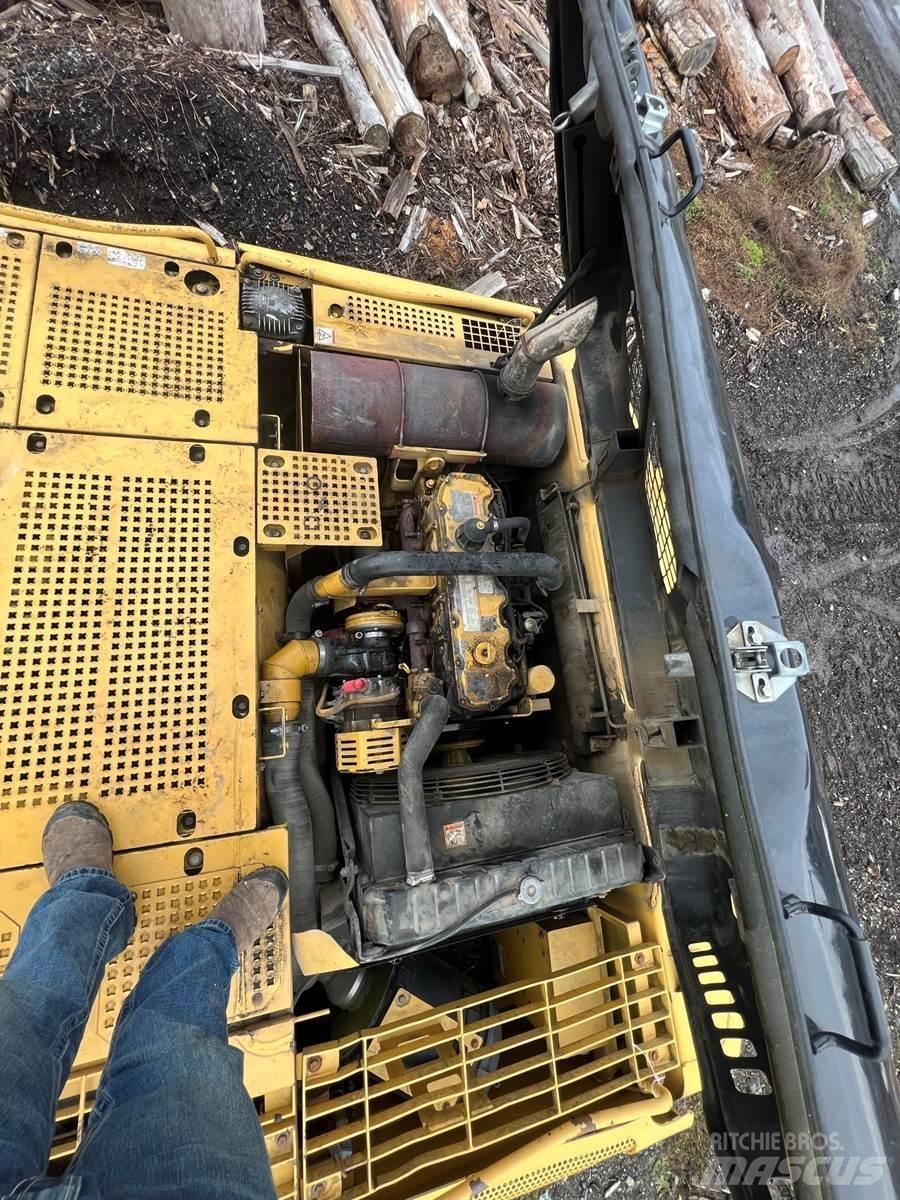 CAT 325C Incarcatoare forestiere