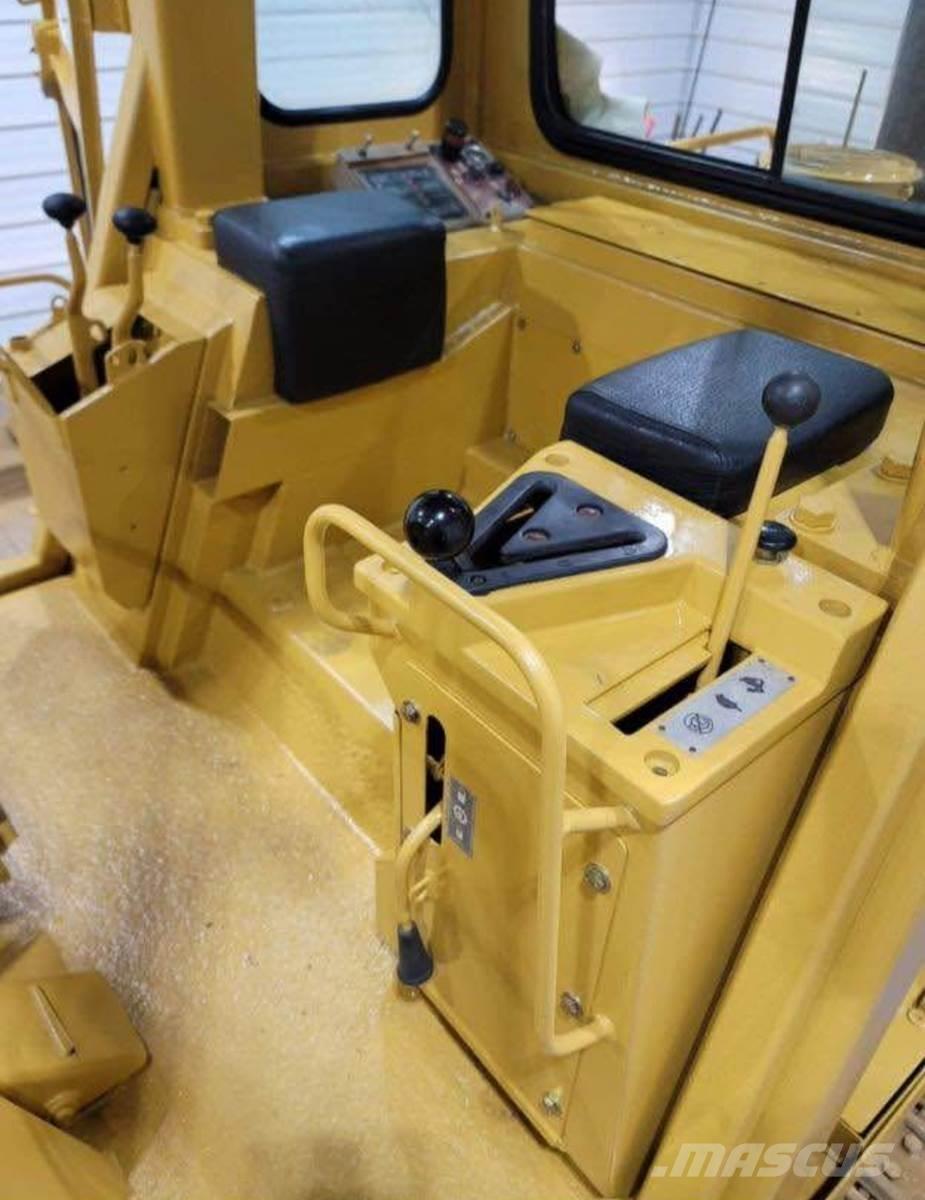 CAT 943 Încarcatoare cu excavator