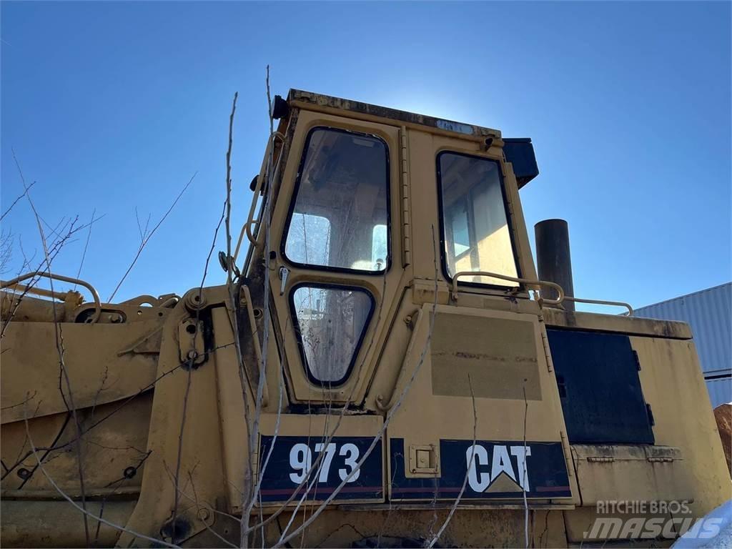 CAT 973 Încarcatoare cu excavator