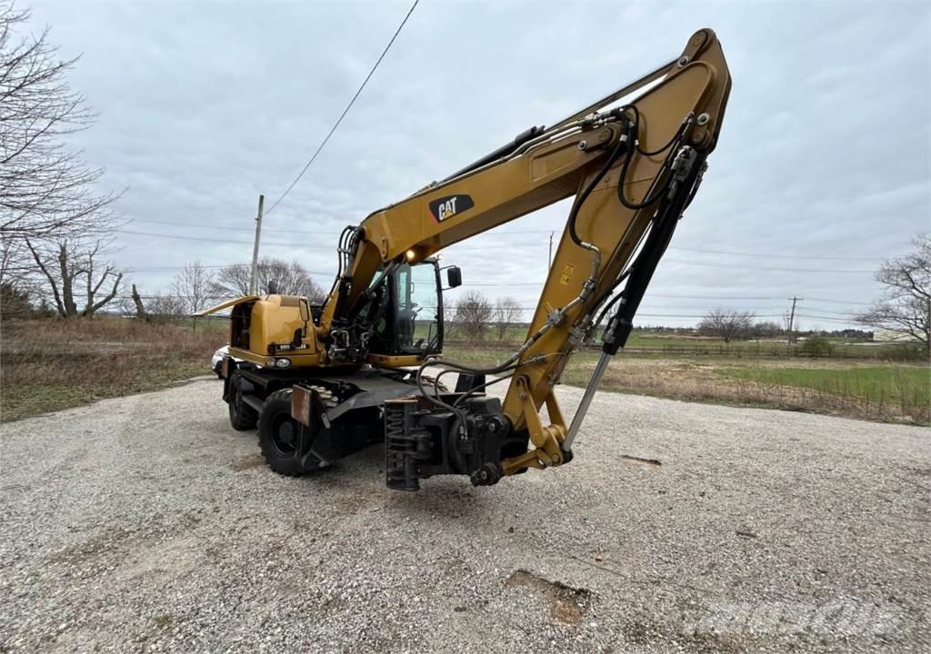 CAT M313D Excavatoare cu roti