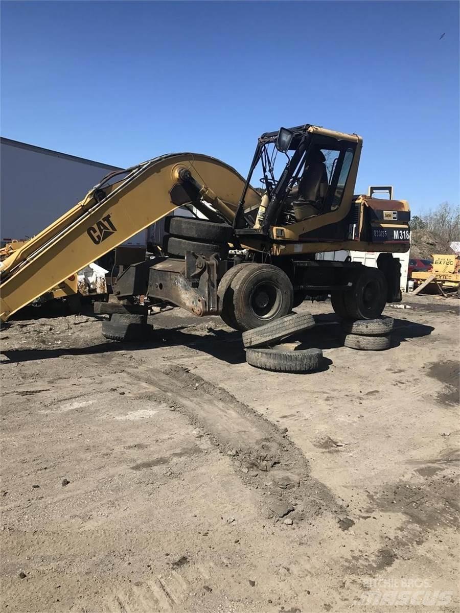CAT M318 Excavatoare cu roti