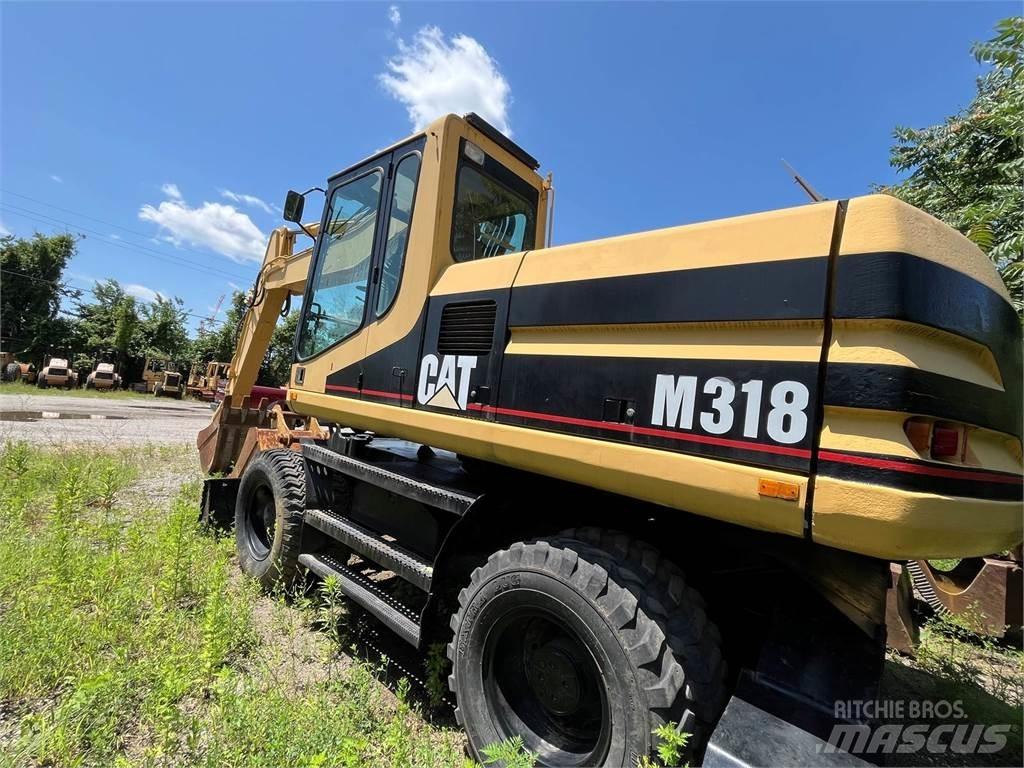 CAT M318 Excavatoare cu roti