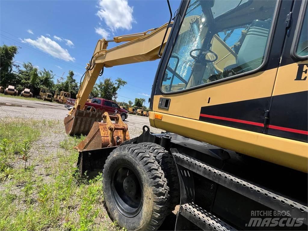 CAT M318 Excavatoare cu roti