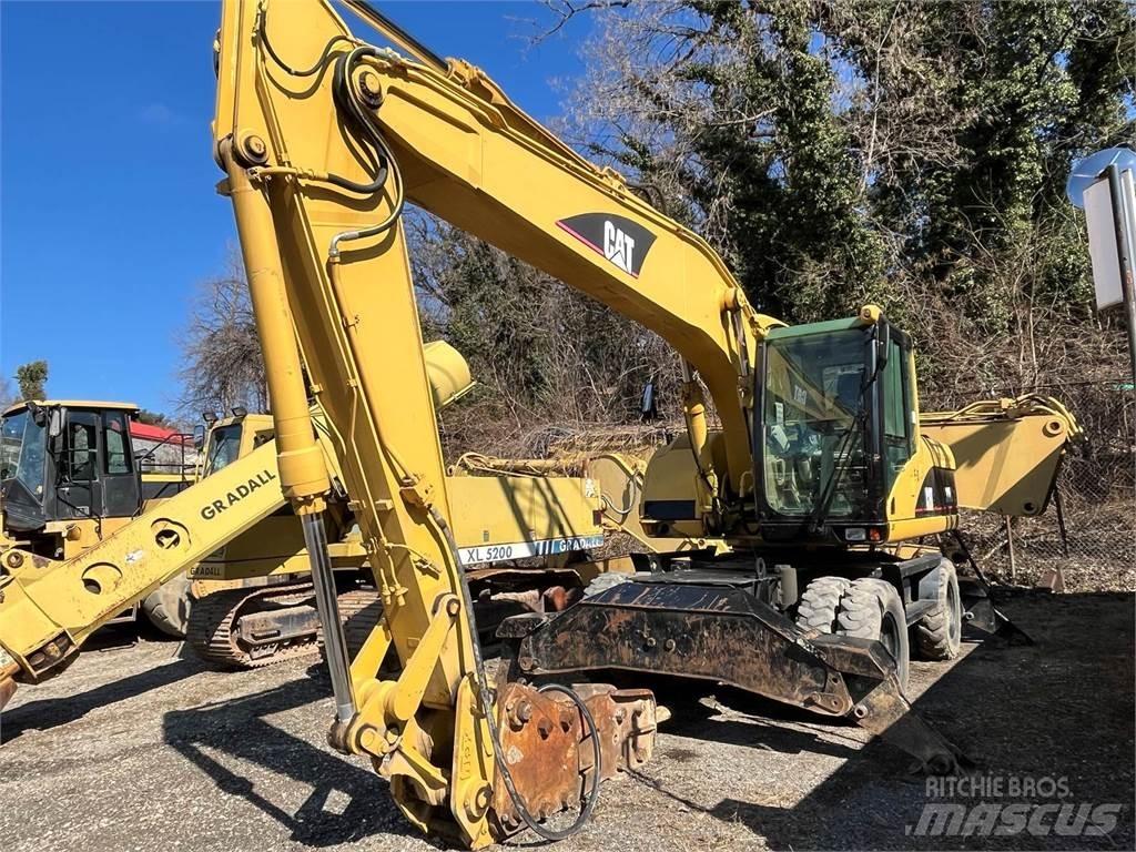 CAT M318C Excavatoare cu roti