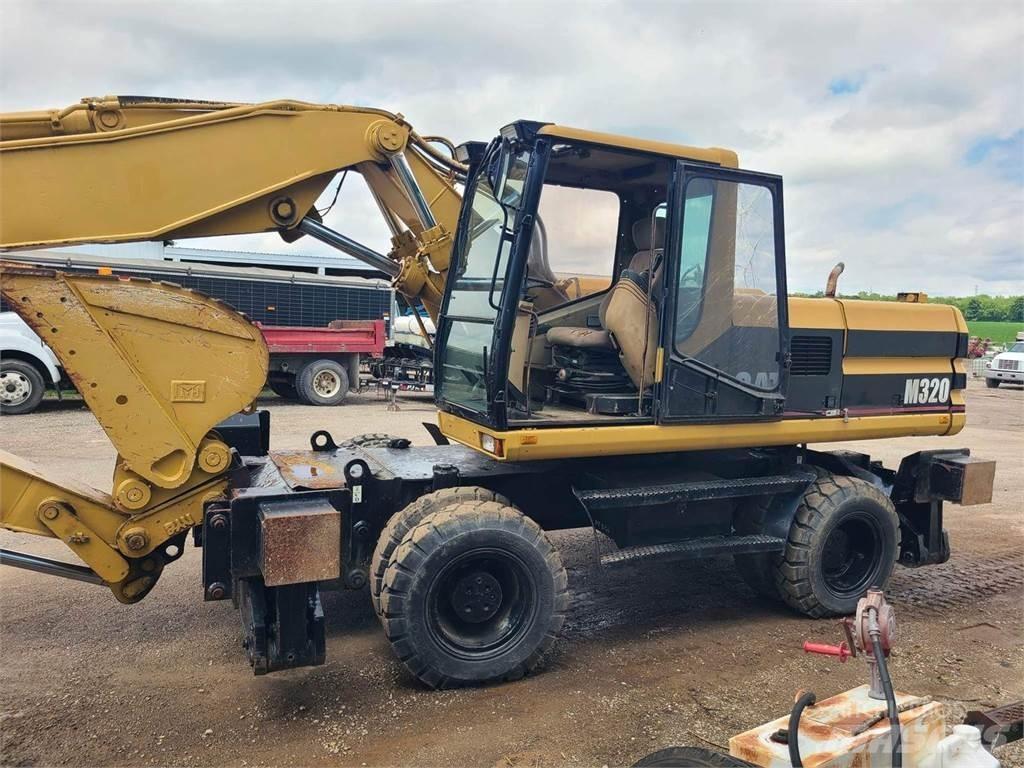 CAT M320 Excavatoare cu roti
