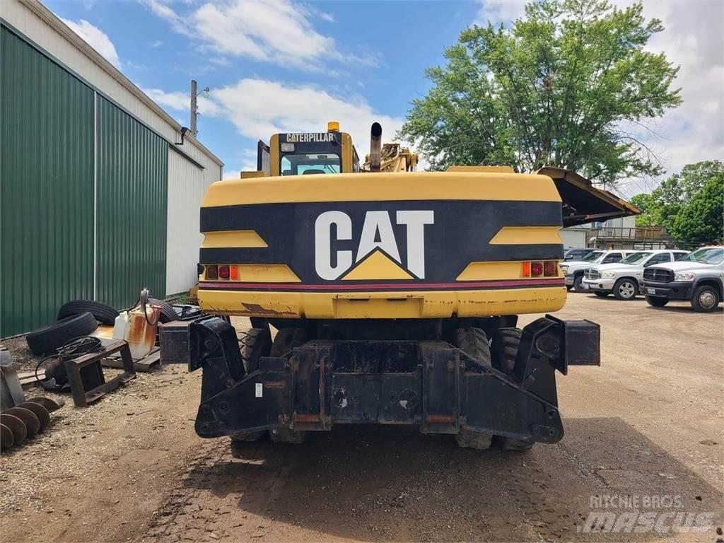 CAT M320 Excavatoare cu roti