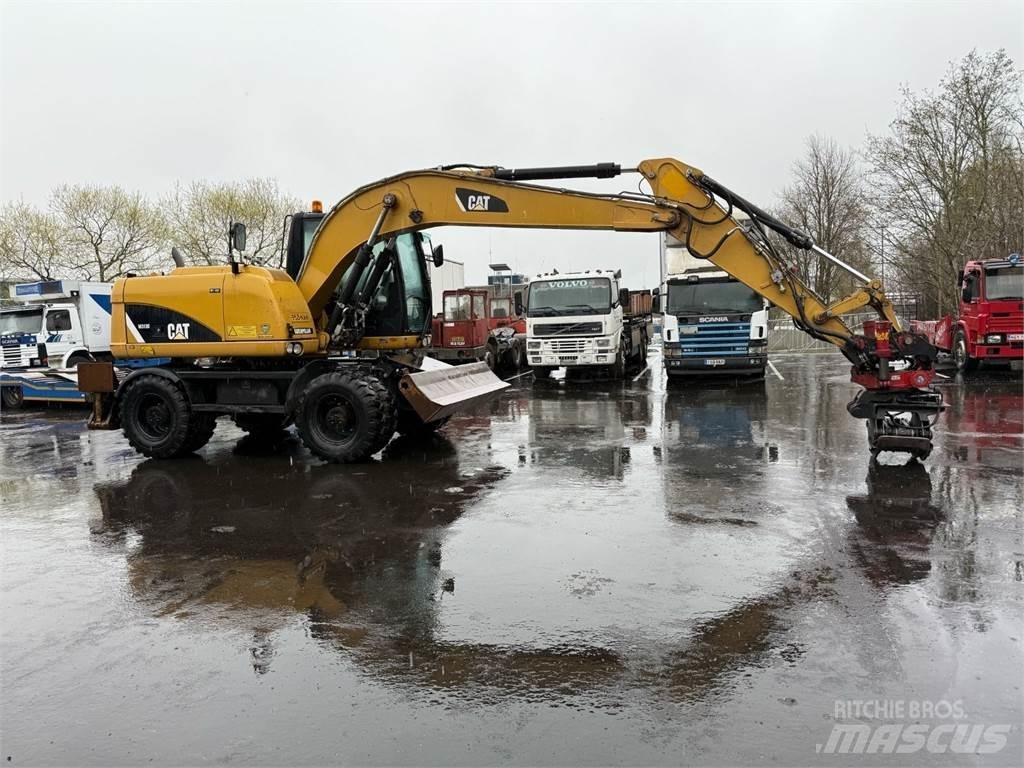 CAT M313 D Excavatoare cu roti