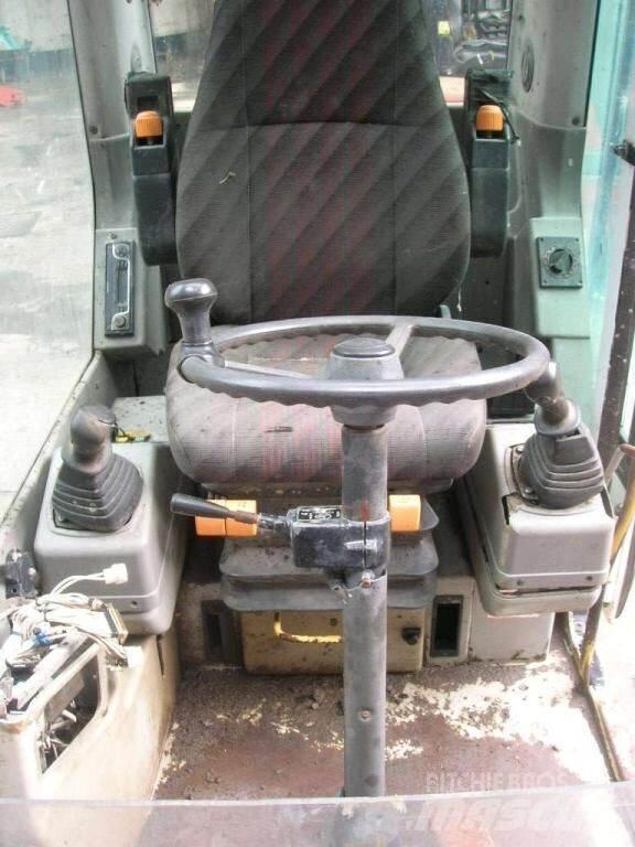 O&K  Cabine si interior