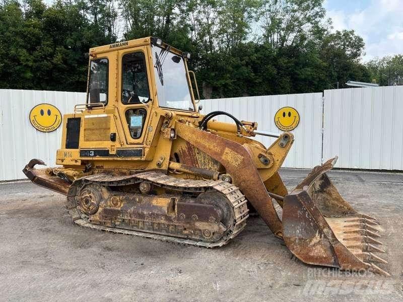 CAT 943 Încarcatoare cu excavator