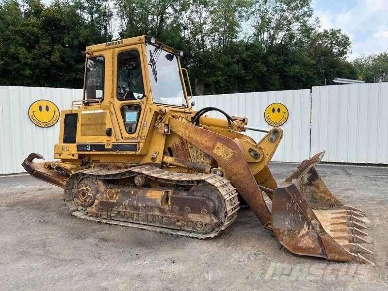 CAT 943 Încarcatoare cu excavator